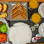 Central Fira Suites Отель